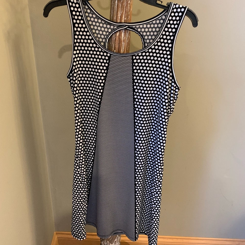 New w/tag Black and white women’s dress size extra small.
